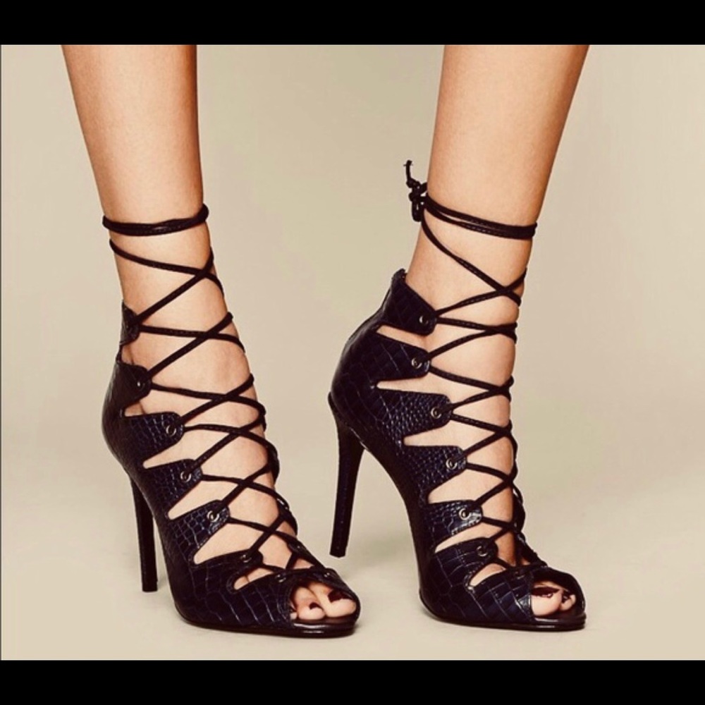 Schutz black strappy lace up heels
